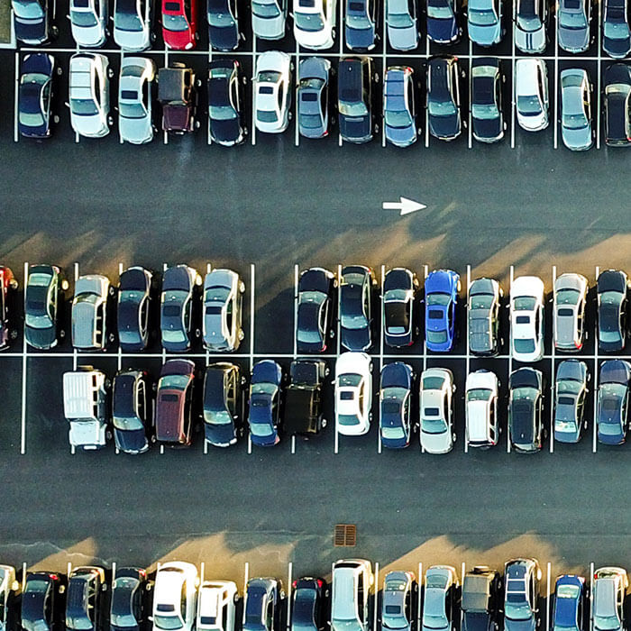 aerial view of cars in parking lot