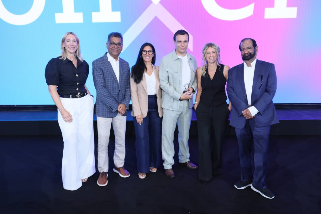 IDeaS leadership presenting Clément Deplanche the 2026 Changemaker Award