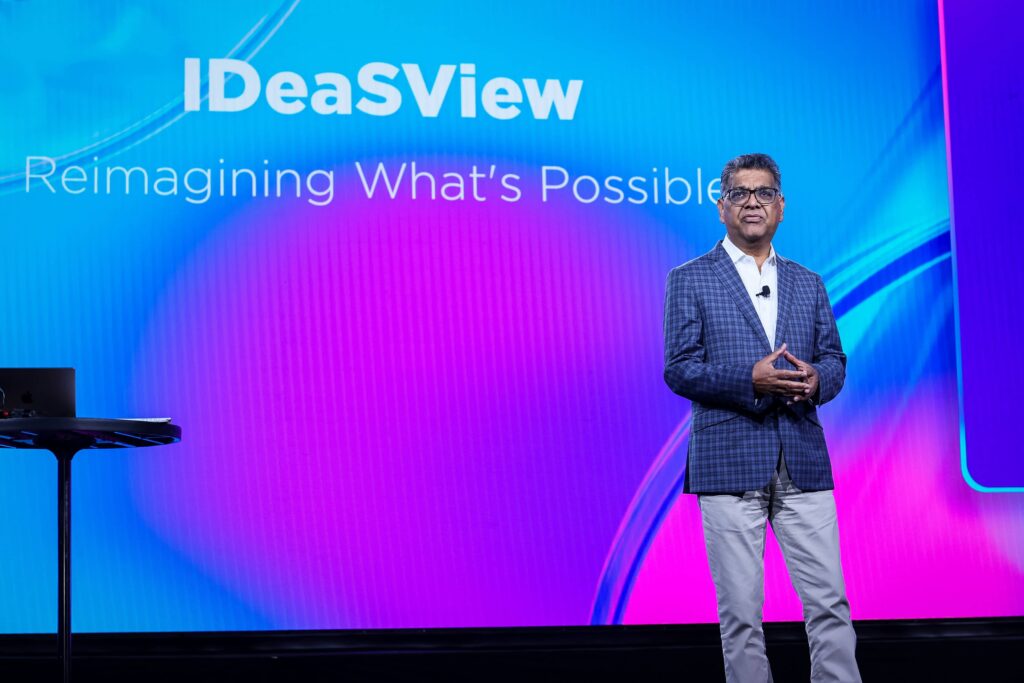 Photo of Sanjay Nagalia on stage at Converge 2026